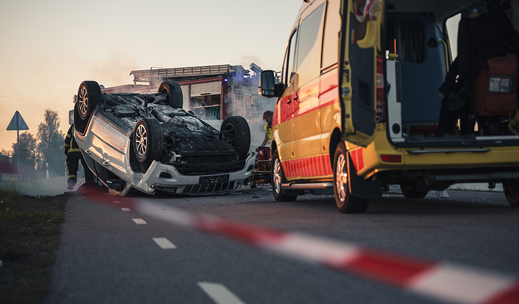 ambulance on scene of major car accident with catastrophic injuries